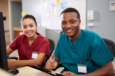 nurse working together in nurses station